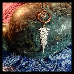Lightweight Fern Pendant w silver & copper tone metal on leather cord.
